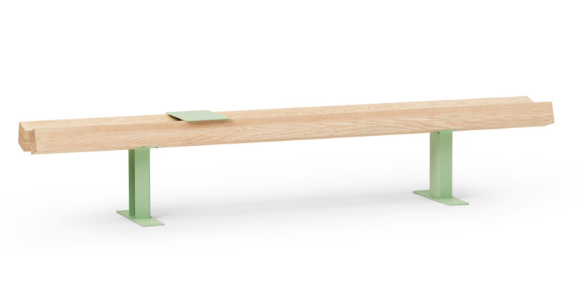 light wood bench with light green metal legs