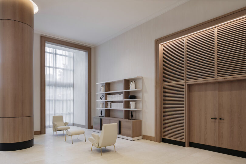 Bright and airy living room with neutral-toned furnishings, accentuated by soft, natural jute rugs and linen curtains