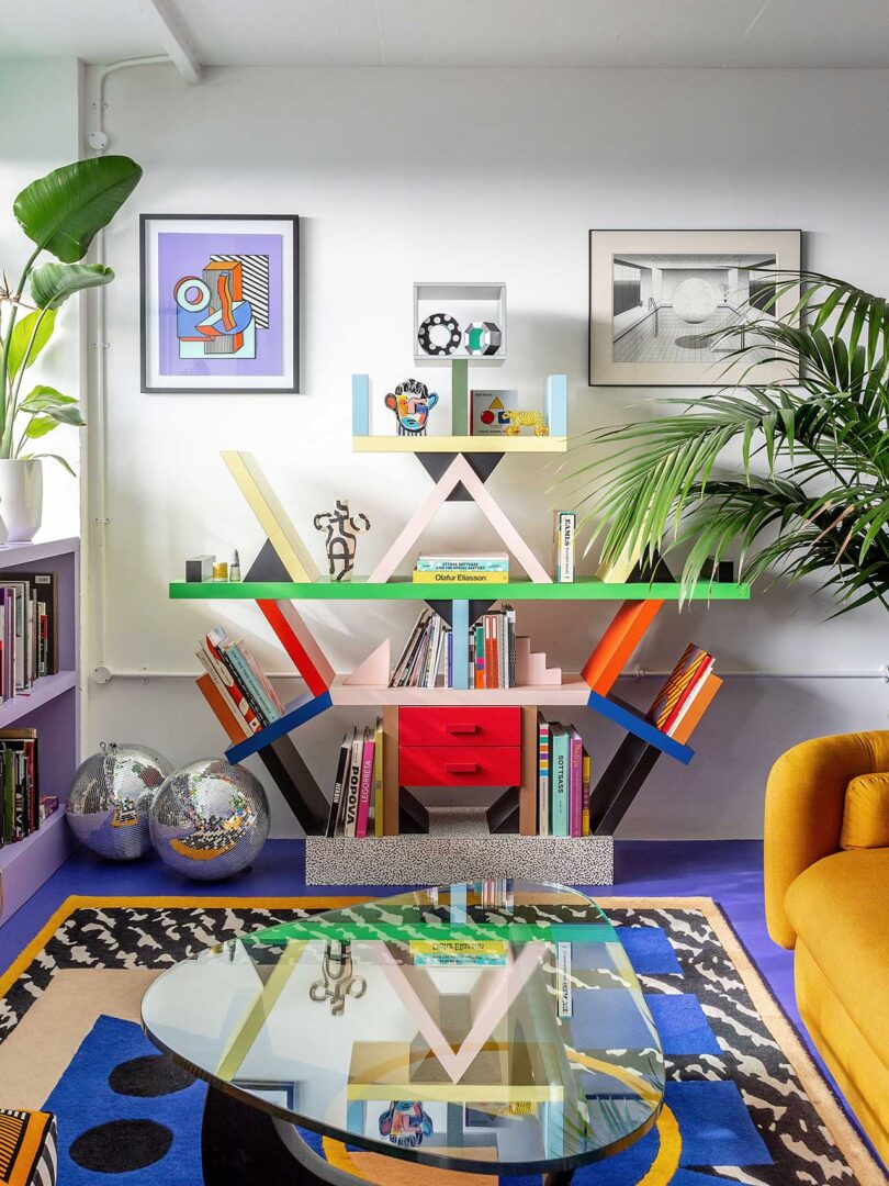 interior view of seating area with Memphis bookshelf with books and objects on it.