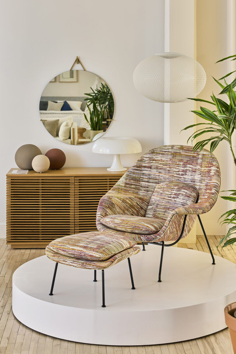 showroom setting with Womb chair in textured fabric