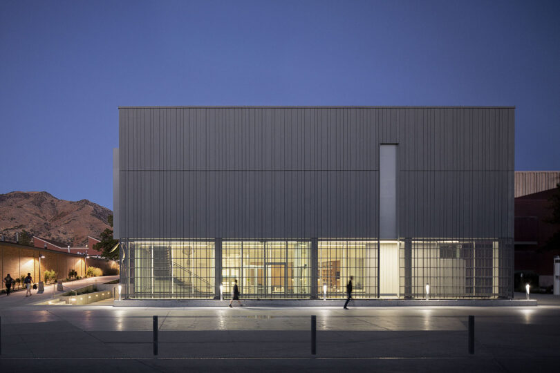 modern museum with lots of windows at dusk