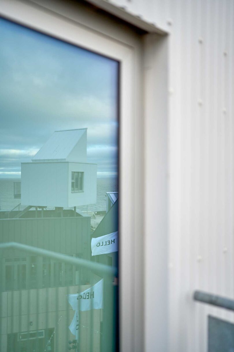 angled view of door exterior of elevated living pod